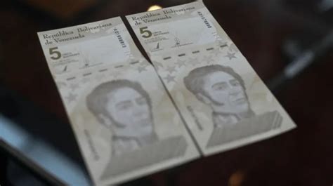 bolivarmoney|Venezuela burns through cash to shore up new bolivar.